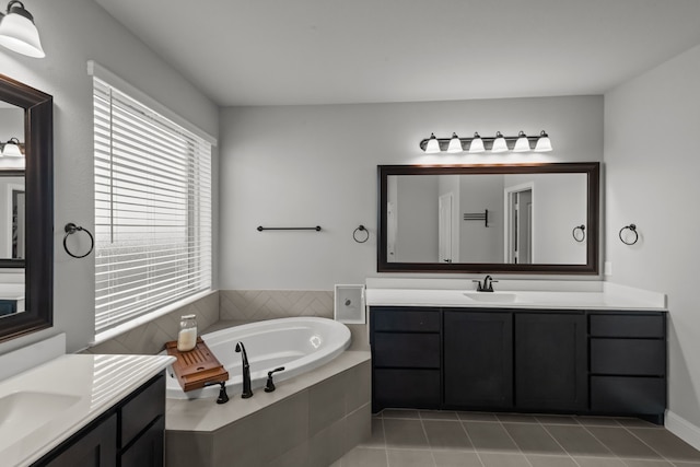 612 Wildriver Trl, Fort Worth, TX 76131 - bathroom with two vanities, a bath, and tile patterned floors