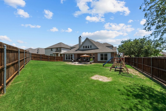 612 Wildriver Trl, Fort Worth, TX 76131 - rear view of property featuring a chimney, a playground, brick siding, and a patio
