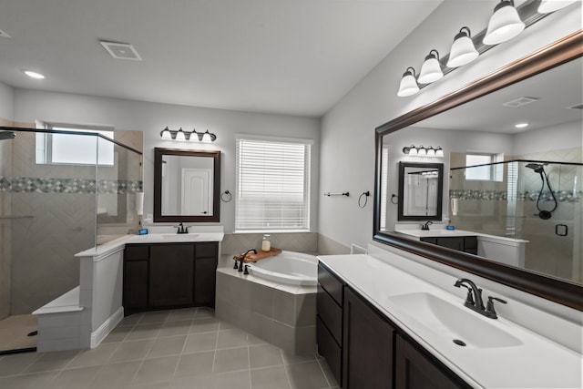 612 Wildriver Trl, Fort Worth, TX 76131 - full bath with a stall shower, plenty of natural light, tile patterned flooring, and two vanities