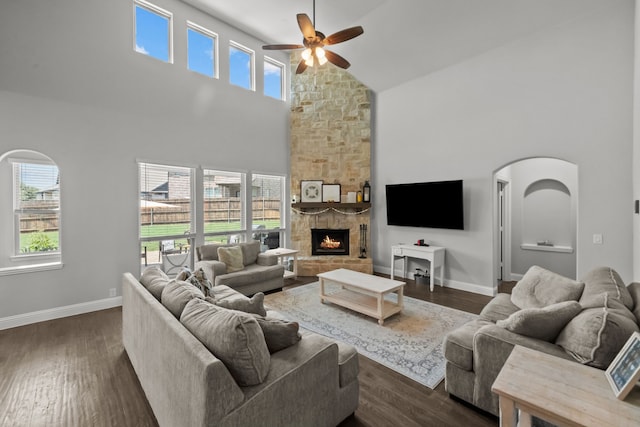 612 Wildriver Trl, Fort Worth, TX 76131 - living area featuring high vaulted ceiling, ceiling fan, healthy amount of natural light, a stone fireplace, and dark wood finished floors