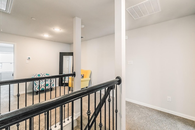 1129 Rusk Way, Lewisville, TX 75077 - corridor featuring an upstairs landing, carpet flooring, baseboards, and recessed lighting
