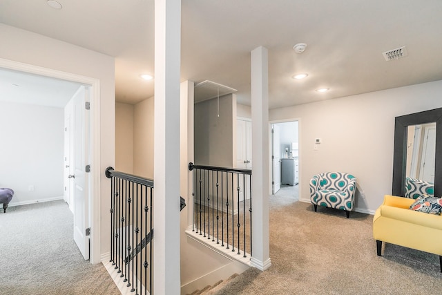 1129 Rusk Way, Lewisville, TX 75077 - hall with carpet floors, an upstairs landing, attic access, and recessed lighting