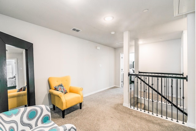 1129 Rusk Way, Lewisville, TX 75077 - living area featuring an upstairs landing, carpet, and recessed lighting