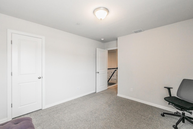 1129 Rusk Way, Lewisville, TX 75077 - carpeted office space featuring baseboards