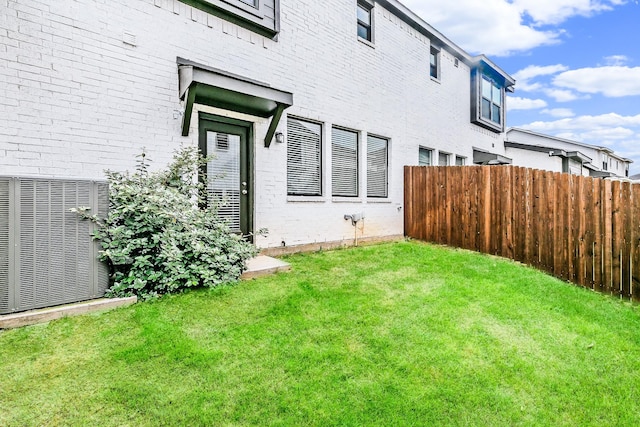 1129 Rusk Way, Lewisville, TX 75077 - view of yard featuring central air condition unit