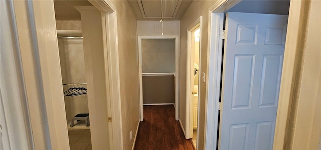 5632 Centeridge Dr, Dallas, TX 75249 - corridor with attic access and dark wood-type flooring