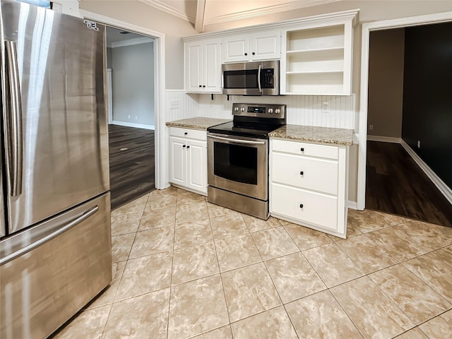 107 Summit Dr, Bossier City, LA 71111 - kitchen with stainless steel appliances, ornamental molding, open shelves, white cabinets, and light stone countertops