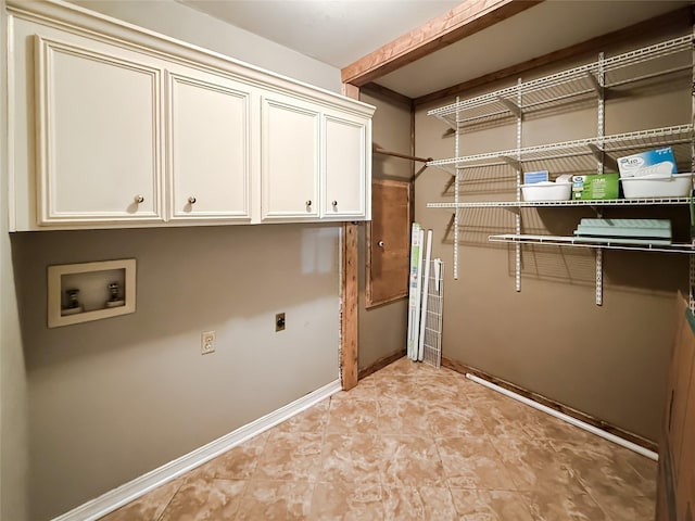107 Summit Dr, Bossier City, LA 71111 - laundry area with hookup for an electric dryer, cabinet space, hookup for a washing machine, and baseboards