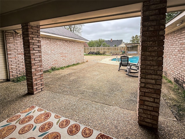 107 Summit Dr, Bossier City, LA 71111 - fenced backyard with a patio area