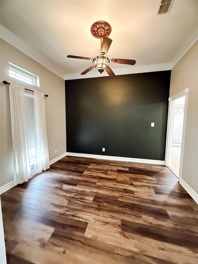 107 Summit Dr, Bossier City, LA 71111 - spare room featuring a ceiling fan, wood finished floors, baseboards, and crown molding
