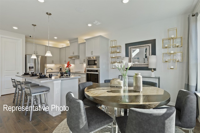 2515 Ridgecrest Ln, Sherman, TX 75092 - dining room with dark wood-style floors, recessed lighting, and baseboards