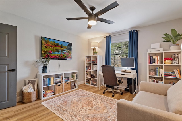 7204 Kingswood Dr, Fort Worth, TX 76133 - office with ceiling fan, wood finished floors, and baseboards
