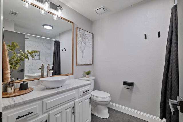 7204 Kingswood Dr, Fort Worth, TX 76133 - full bathroom featuring vanity, toilet, tile patterned flooring, a shower with curtain, and baseboards