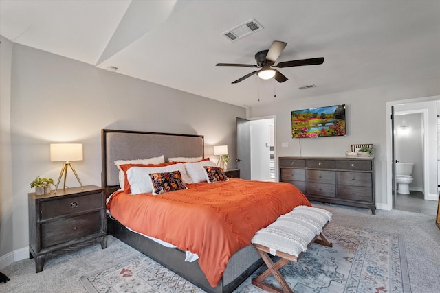 7204 Kingswood Dr, Fort Worth, TX 76133 - carpeted bedroom featuring baseboards, ensuite bath, and ceiling fan