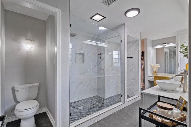 7204 Kingswood Dr, Fort Worth, TX 76133 - bathroom with vanity, a marble finish shower, toilet, and baseboards