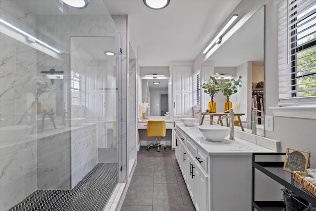 7204 Kingswood Dr, Fort Worth, TX 76133 - full bathroom featuring a shower stall, double vanity, and tile patterned flooring