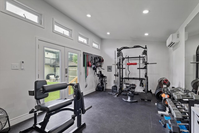 7204 Kingswood Dr, Fort Worth, TX 76133 - gym with a wall unit AC, recessed lighting, baseboards, and french doors