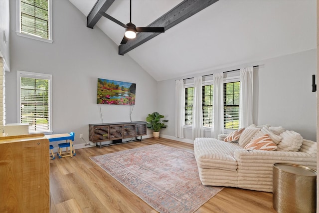 7204 Kingswood Dr, Fort Worth, TX 76133 - living area with high vaulted ceiling, beam ceiling, ceiling fan, plenty of natural light, and light wood finished floors