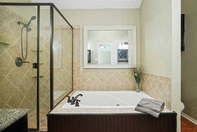 5630 Cancun Dr, North Richland Hills, TX 76180 - bathroom featuring a whirlpool tub, a shower stall, toilet, and vanity