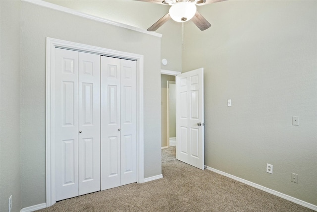 5630 Cancun Dr, North Richland Hills, TX 76180 - unfurnished bedroom featuring light carpet, a closet, baseboards, and ceiling fan