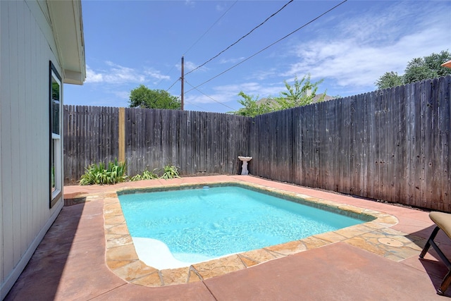 5630 Cancun Dr, North Richland Hills, TX 76180 - view of swimming pool featuring a patio area and a fenced backyard