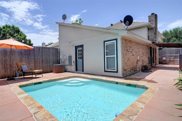5630 Cancun Dr, North Richland Hills, TX 76180 - view of swimming pool with a patio area
