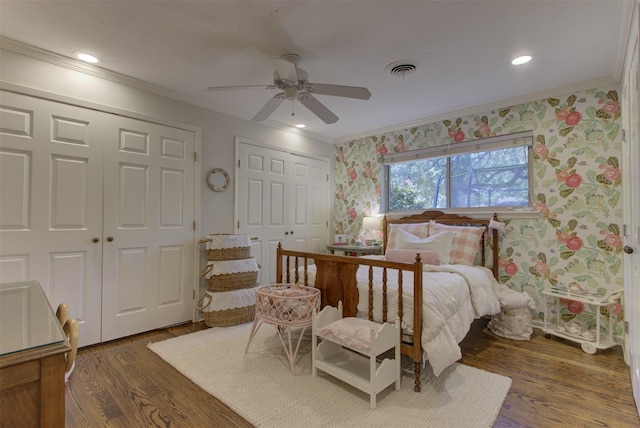 4200 Bilglade Rd, Fort Worth, TX 76109 - bedroom with ornamental molding, wallpapered walls, two closets, wood finished floors, and ceiling fan