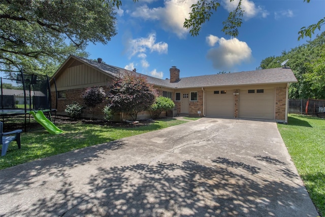 4200 Bilglade Rd, Fort Worth, TX 76109 - ranch-style home featuring a trampoline, brick siding, an attached garage, driveway, and a chimney