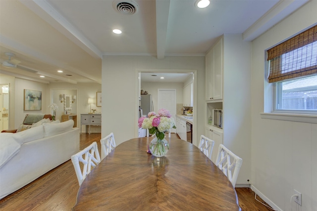 4200 Bilglade Rd, Fort Worth, TX 76109 - dining area featuring wood finished floors, beam ceiling, recessed lighting, ornamental molding, and baseboards