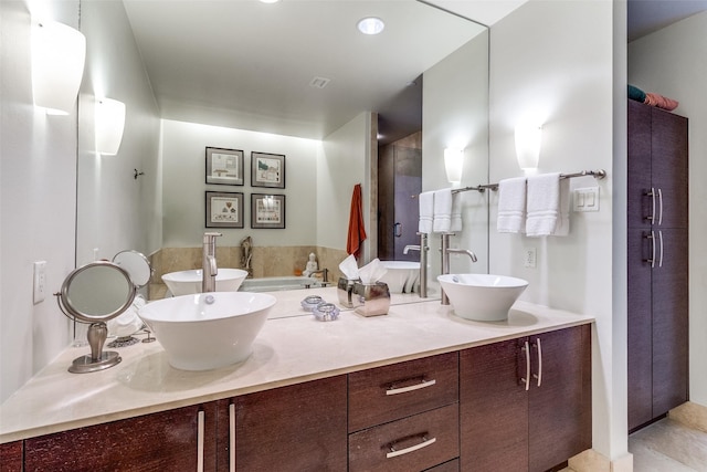 3111 Welborn St Unit 1303, Dallas, TX 75219 - bathroom with double vanity