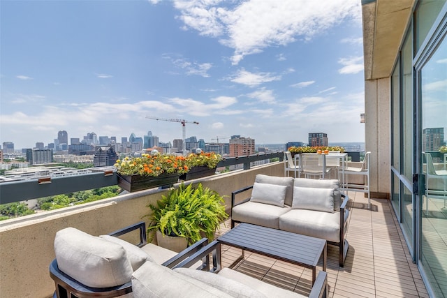 3111 Welborn St Unit 1303, Dallas, TX 75219 - balcony with a skyline view and an outdoor living space