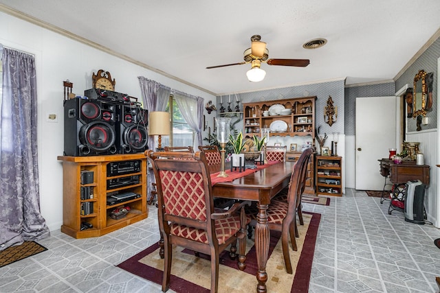 2530 Robin Ln, Garland, TX 75041 - dining space with crown molding, a ceiling fan, and wallpapered walls