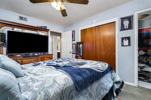 2530 Robin Ln, Garland, TX 75041 - bedroom featuring carpet floors, a closet, and ceiling fan