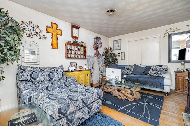 2530 Robin Ln, Garland, TX 75041 - living room with wood finished floors and baseboards