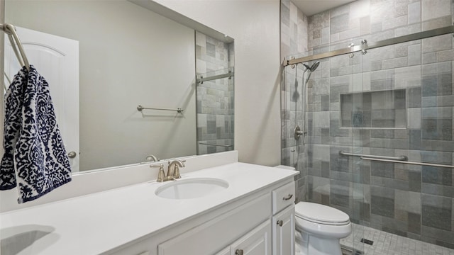 1530 Petaluma Dr, Rockwall, TX 75087 - full bath with double vanity, a shower stall, and toilet
