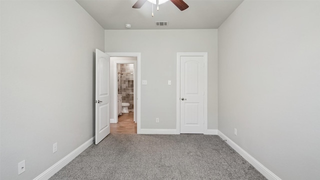 1530 Petaluma Dr, Rockwall, TX 75087 - unfurnished bedroom with carpet, baseboards, and a ceiling fan