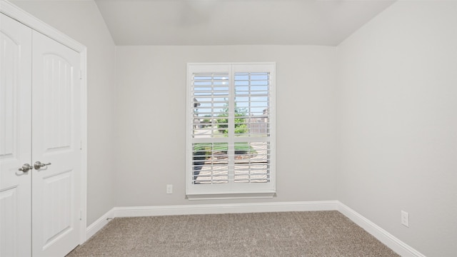 1530 Petaluma Dr, Rockwall, TX 75087 - carpeted empty room with baseboards and vaulted ceiling