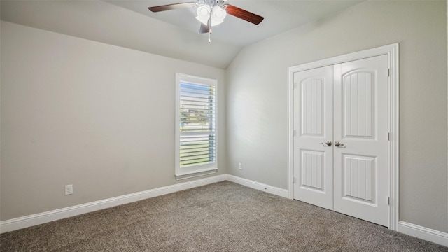1530 Petaluma Dr, Rockwall, TX 75087 - unfurnished bedroom featuring carpet, lofted ceiling, a closet, baseboards, and a ceiling fan