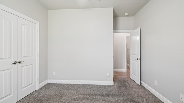 1530 Petaluma Dr, Rockwall, TX 75087 - unfurnished bedroom with carpet floors, baseboards, and a closet