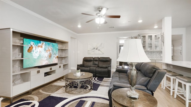 1530 Petaluma Dr, Rockwall, TX 75087 - living area featuring ceiling fan, ornamental molding, light wood-type flooring, recessed lighting, and built in shelves