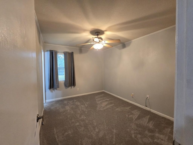 106 Mcanally Dr, Mabank, TX 75147 - spare room featuring ornamental molding, a ceiling fan, dark colored carpet, and baseboards