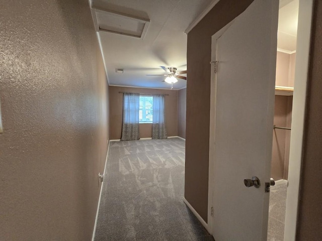 106 Mcanally Dr, Mabank, TX 75147 - hall with attic access, carpet, baseboards, and a textured wall