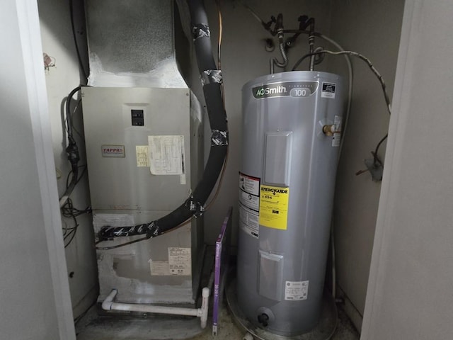 106 Mcanally Dr, Mabank, TX 75147 - utility room featuring water heater and heating unit