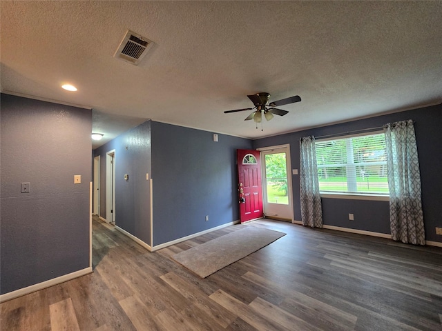 106 Mcanally Dr, Mabank, TX 75147 - empty room with a textured ceiling, wood finished floors, baseboards, a ceiling fan, and recessed lighting