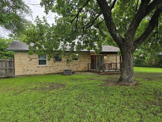 106 Mcanally Dr, Mabank, TX 75147 - rear view of property with brick siding, a patio, and cooling unit