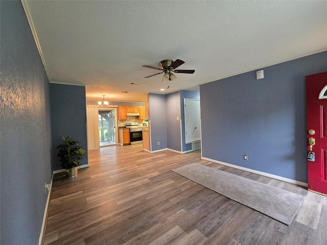 106 Mcanally Dr, Mabank, TX 75147 - unfurnished living room featuring ceiling fan, light wood-type flooring, baseboards, and a textured ceiling
