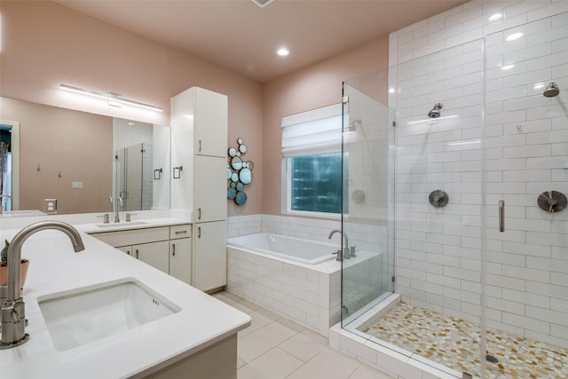 1328 Madeline Pl Unit B, Fort Worth, TX 76107 - bathroom with double vanity, a stall shower, a garden tub, tile patterned flooring, and recessed lighting