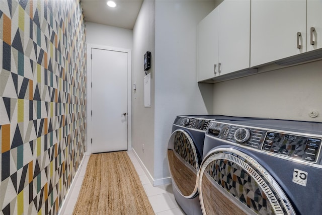 1328 Madeline Pl Unit B, Fort Worth, TX 76107 - washroom with cabinet space, washing machine and clothes dryer, an accent wall, wallpapered walls, and light tile patterned floors