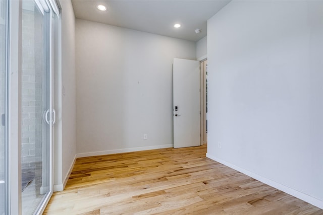 1328 Madeline Pl Unit B, Fort Worth, TX 76107 - empty room featuring light wood-style floors, baseboards, and recessed lighting