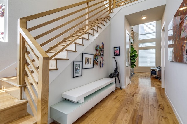 1328 Madeline Pl Unit B, Fort Worth, TX 76107 - stairs featuring wood finished floors and baseboards